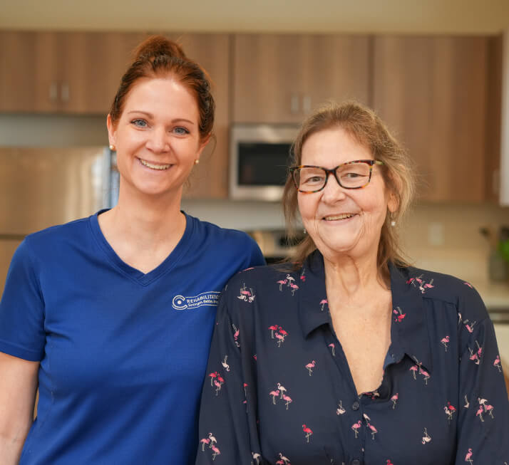Carespring employee smiling with resident
