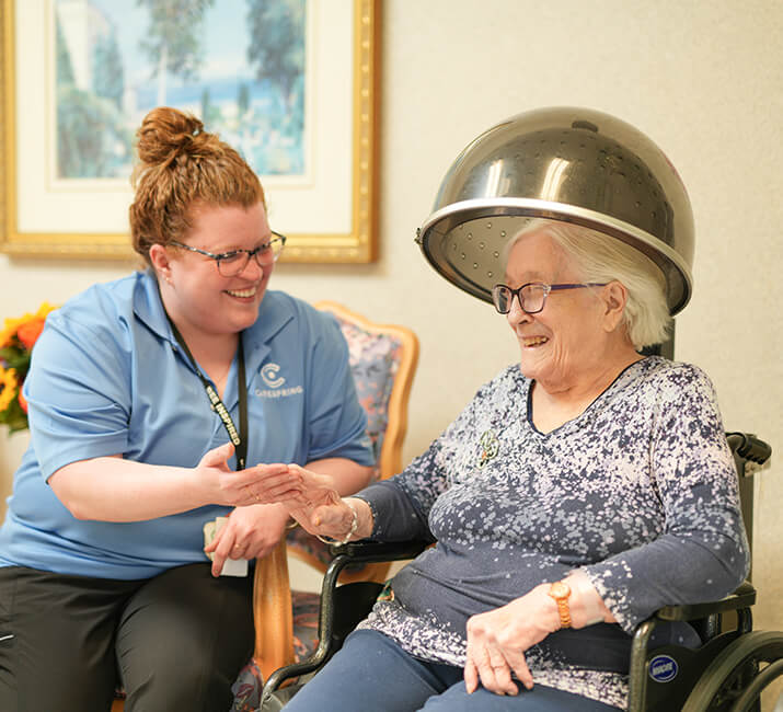 senior woman getting her hair done