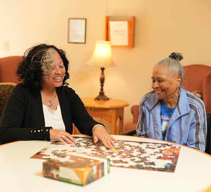 seniors doing a puzzle