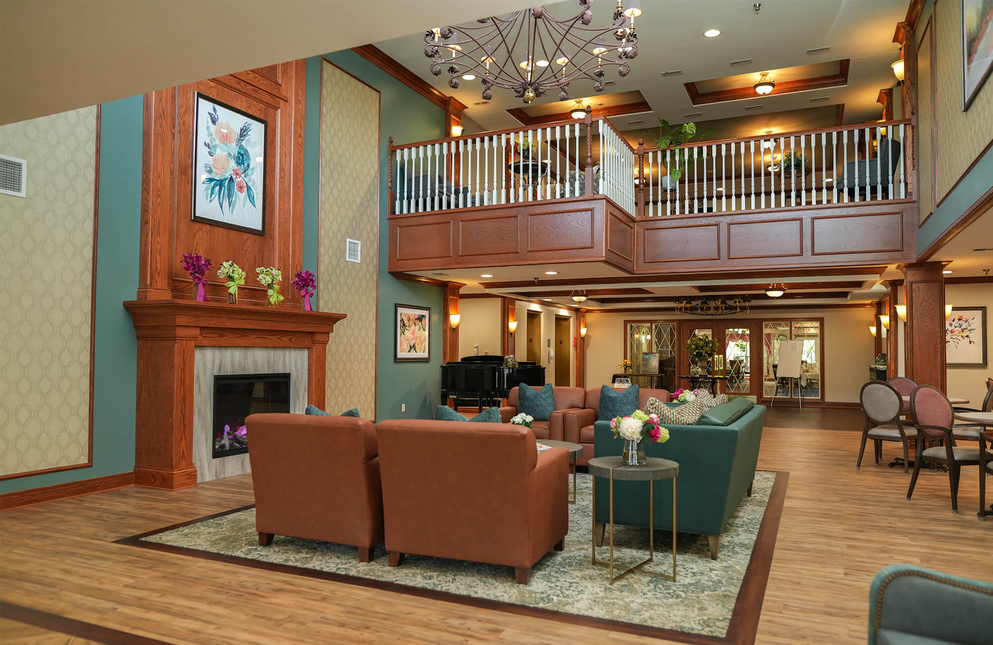 Spacious community area with elegant seating and bright lighting at a senior living community.